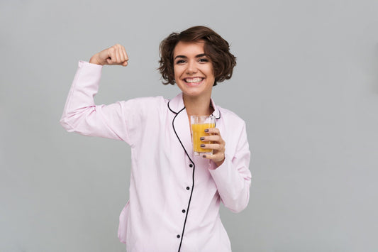 Portrait of a healthy smiling woman in pajamas