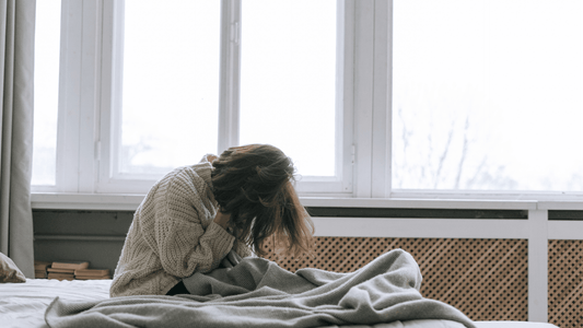woman in bed tired