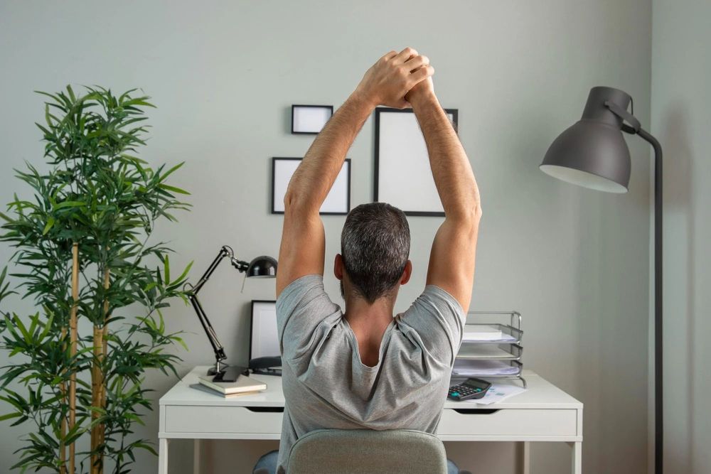 10 Stretching Exercises You Can Do At Your Home Desk