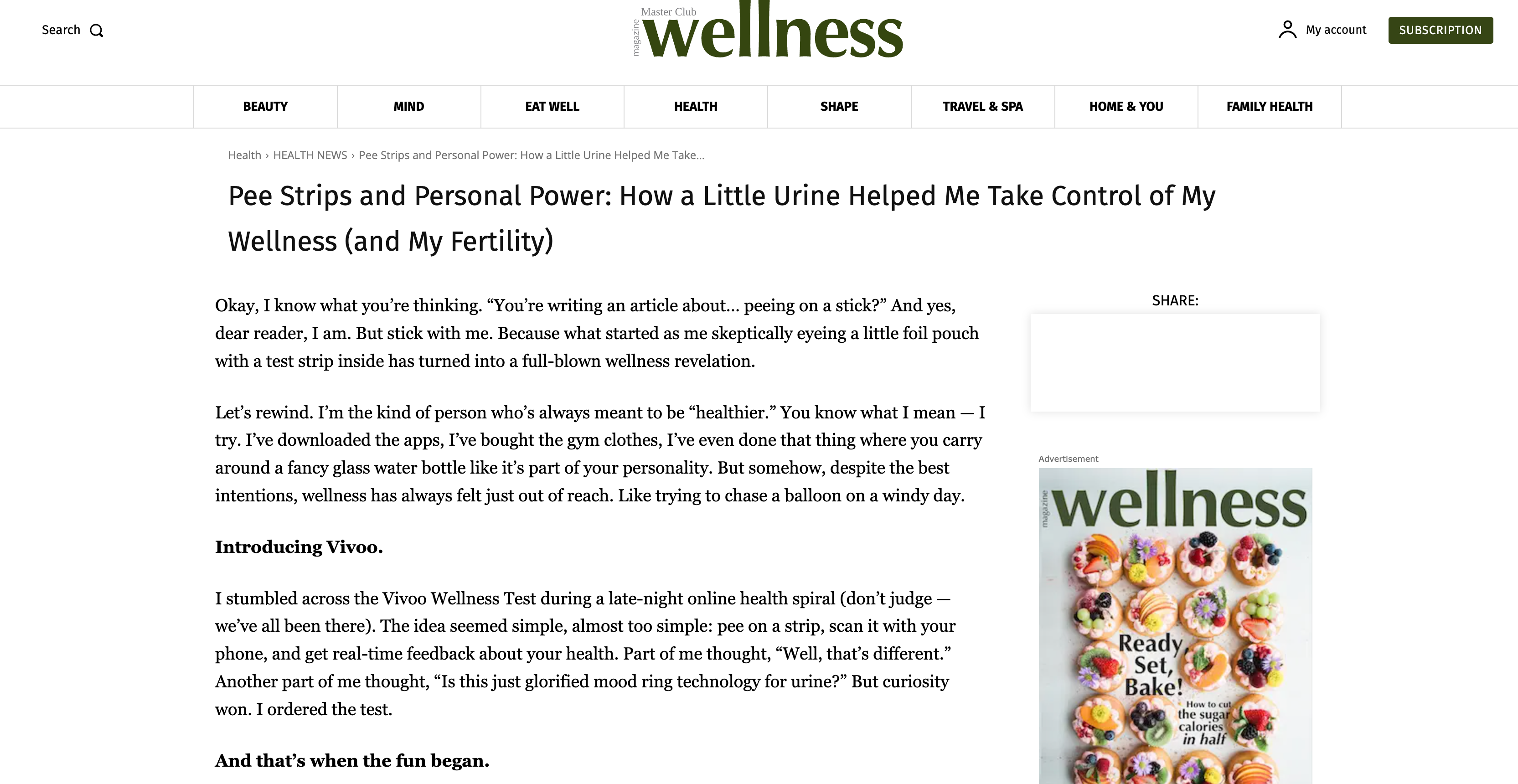 Wellness magazine article on a computer screen with a visible Wellness magazine cover.