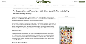 Wellness magazine article on a computer screen with a visible Wellness magazine cover.