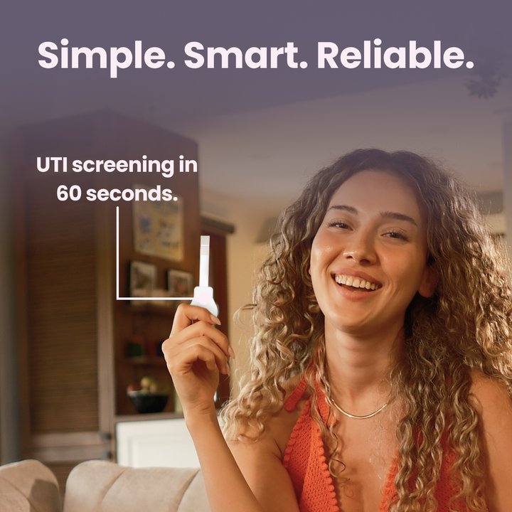 Woman holding UTI test with text about UTI screening in 60 seconds, set against a blurred indoor background.