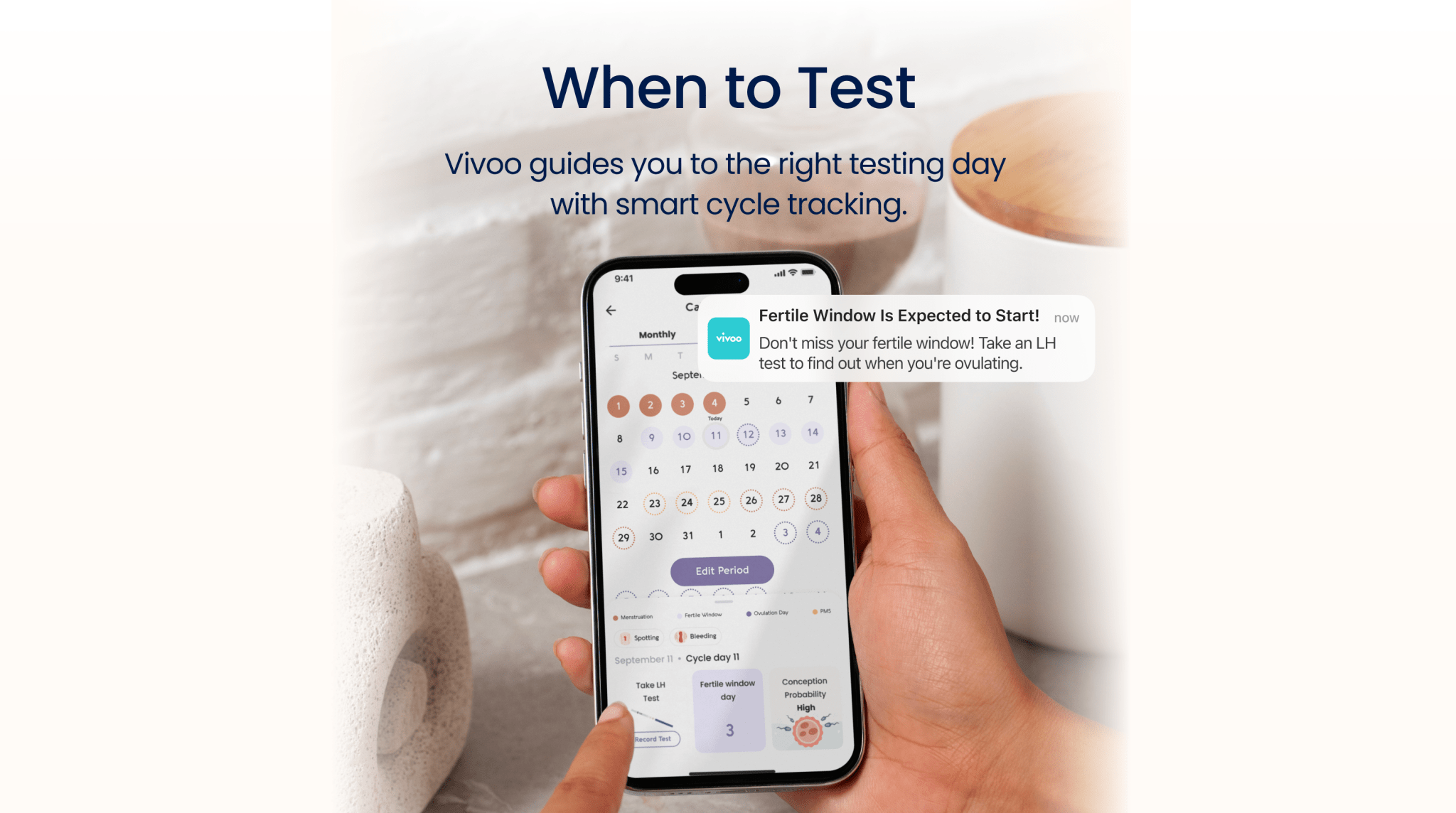 Person holding a smartphone displaying an app with text 'When to Test' and 'Vivoo guides you to the right testing day.'