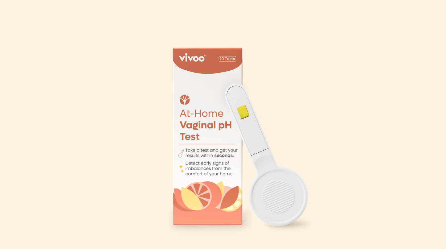 At-Home Vaginal pH Test kit with packaging and device on a beige background